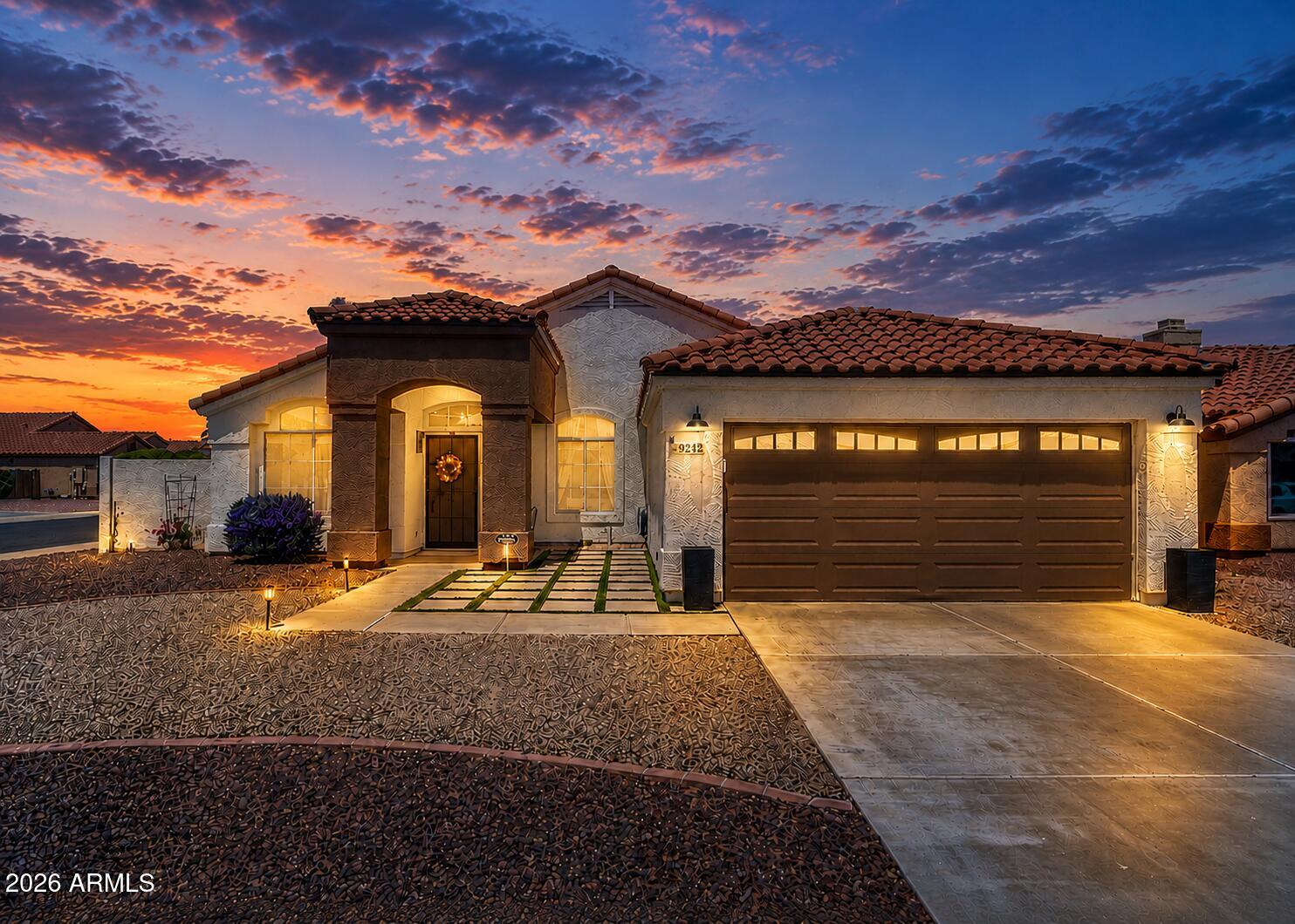 9242 West St John Road Peoria, AZ 85382 - Photo 1 of 59 a house view with a outdoor space
