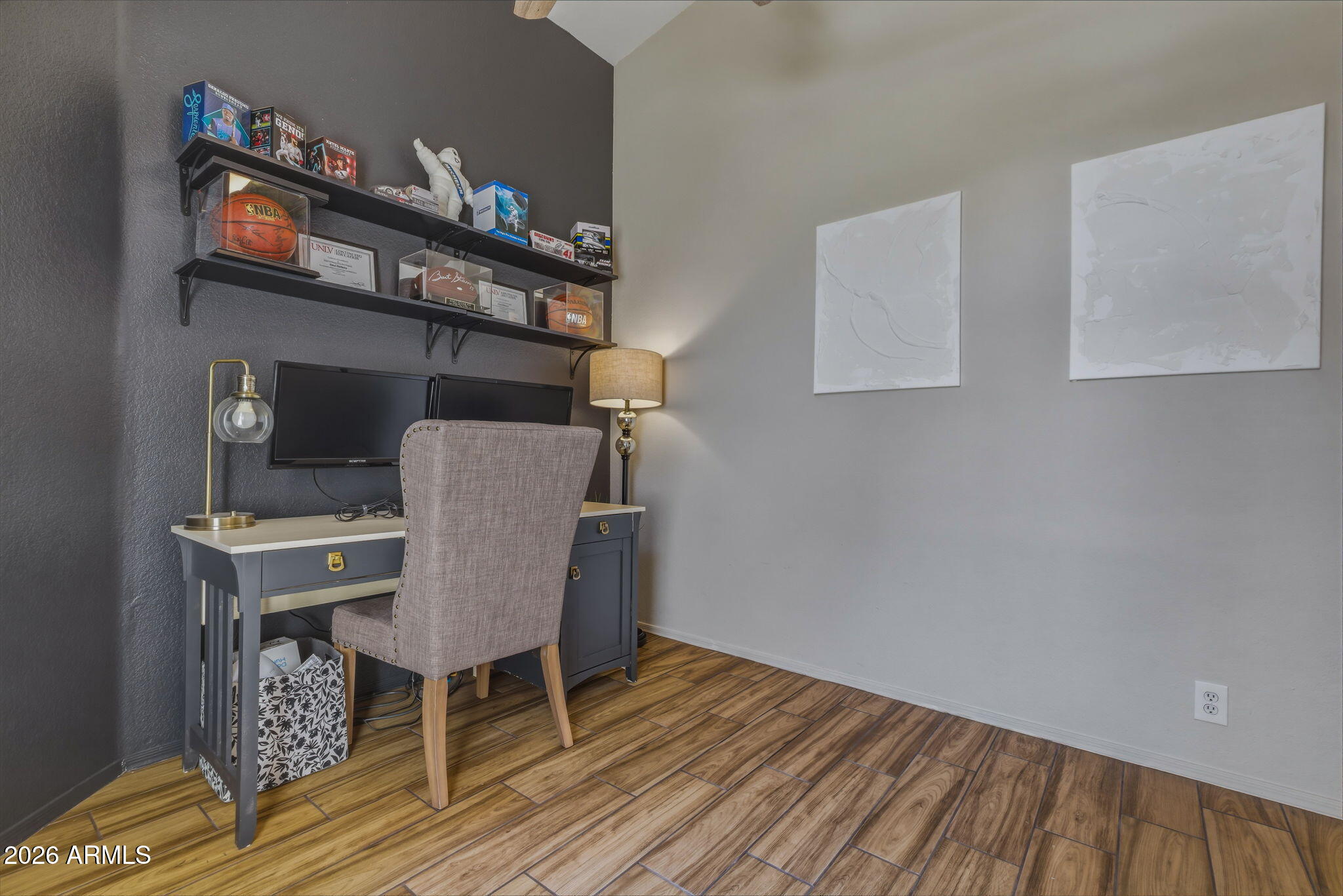 9242 West St John Road Peoria, AZ 85382 - Photo 11 of 59 a view of a dining room with furniture and wooden floor