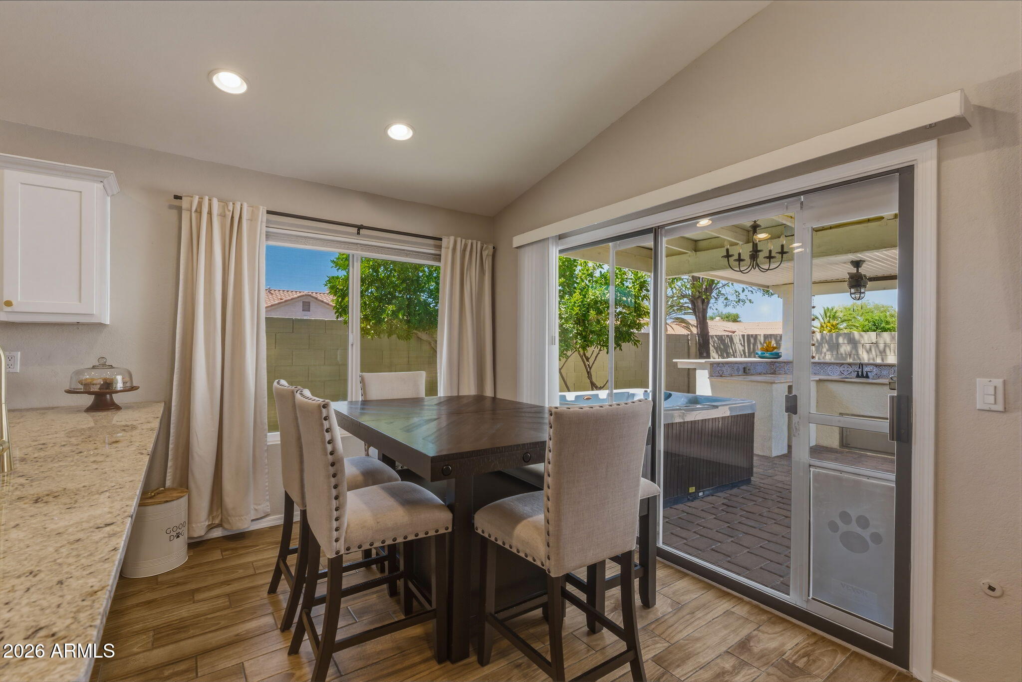9242 West St John Road Peoria, AZ 85382 - Photo 33 of 59 a view of a dining room with furniture window and outside view