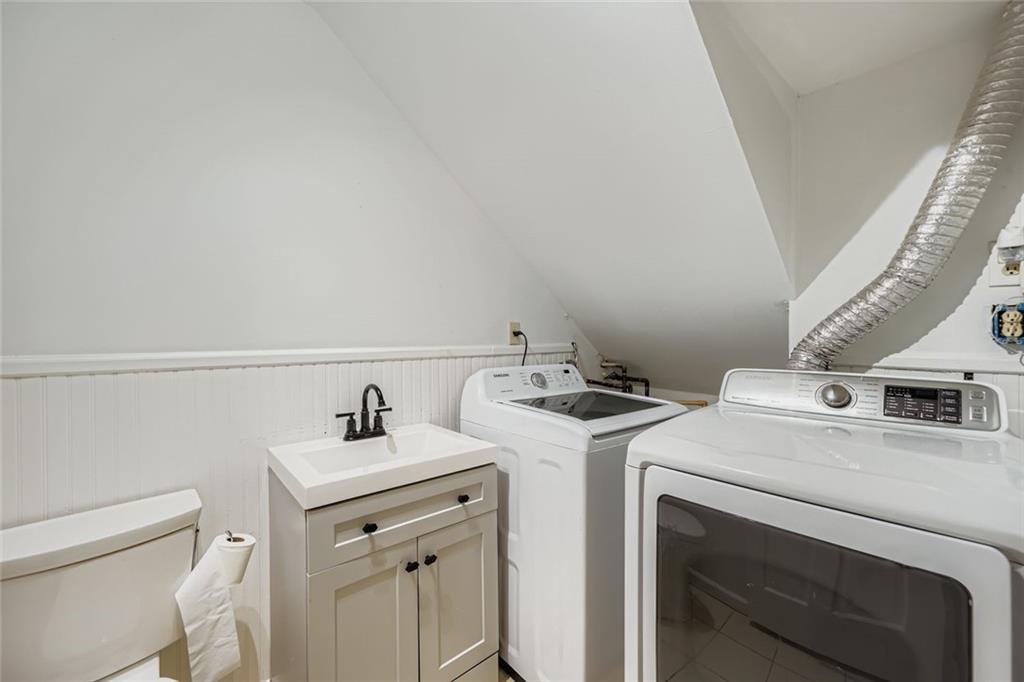 3559 Old Chamblee Tucker Road, Unit F Atlanta, GA 30340 - Photo 5 of 11 a utility room with dryer and washer
