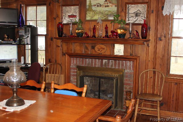 391 Haven Beach Road Moon, VA 23119 - Photo 7 of 43 a view of living room with furniture and fireplace