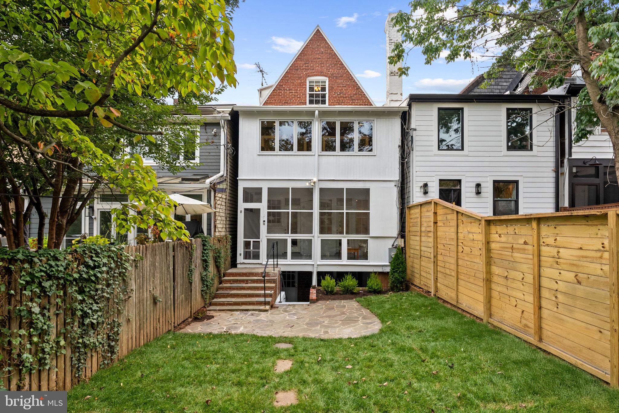 3819 T Street Northwest Washington, DC 20007 - Photo 11 of 27 a front view of a house with garden