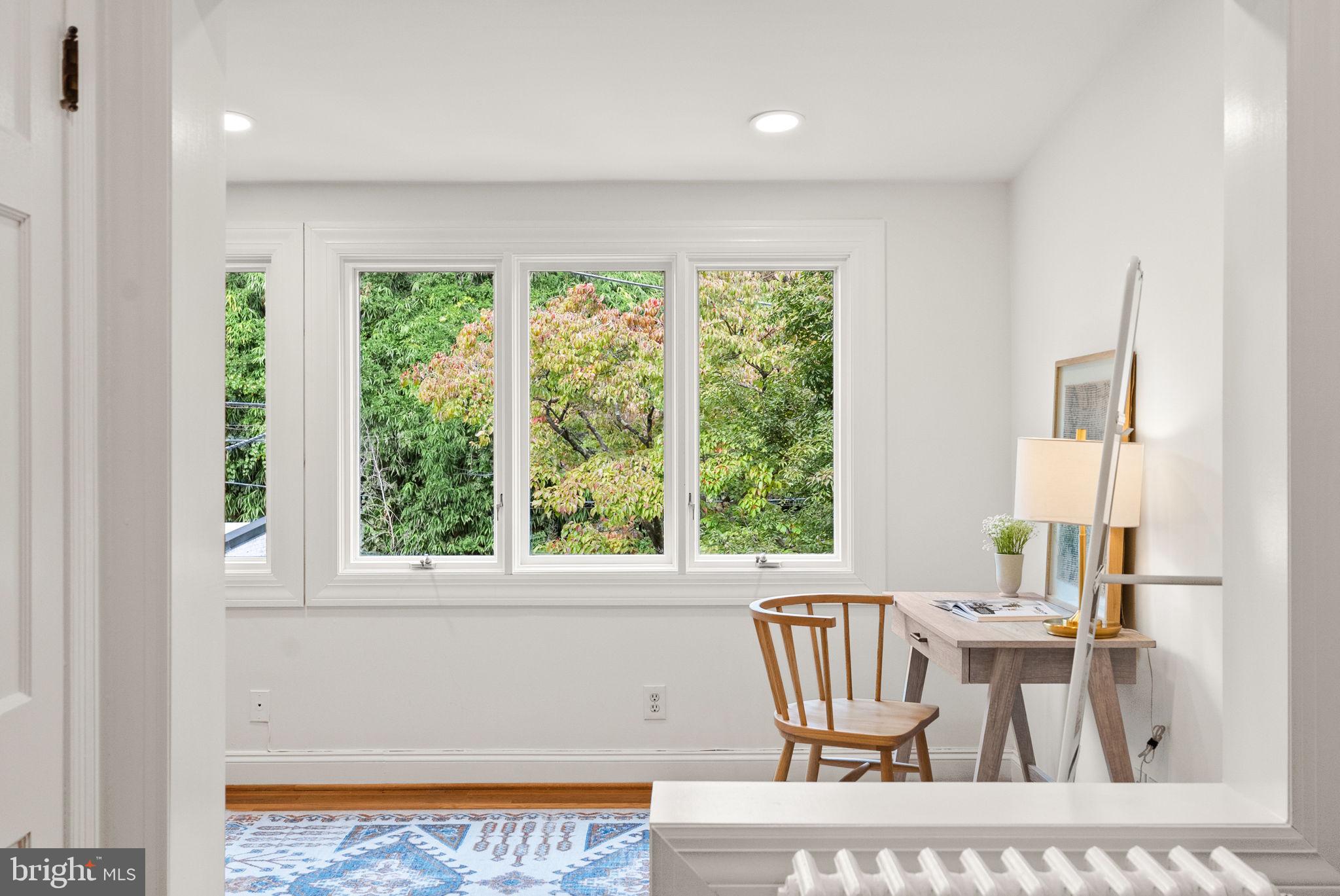 3819 T Street Northwest Washington, DC 20007 - Photo 15 of 27 a view of a dining room with furniture window and outside view