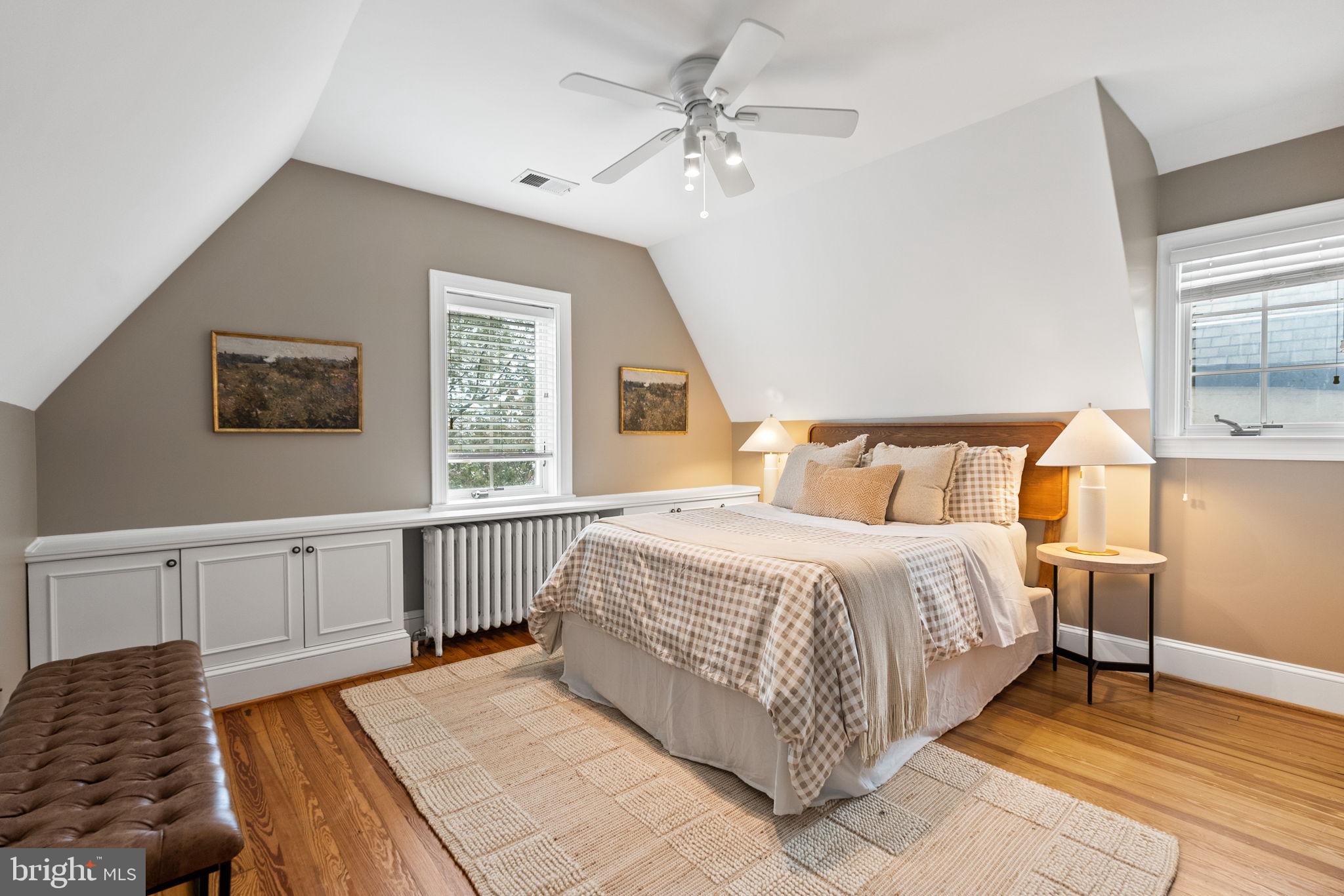 3819 T Street Northwest Washington, DC 20007 - Photo 23 of 27 a spacious bedroom with a bed and a dresser