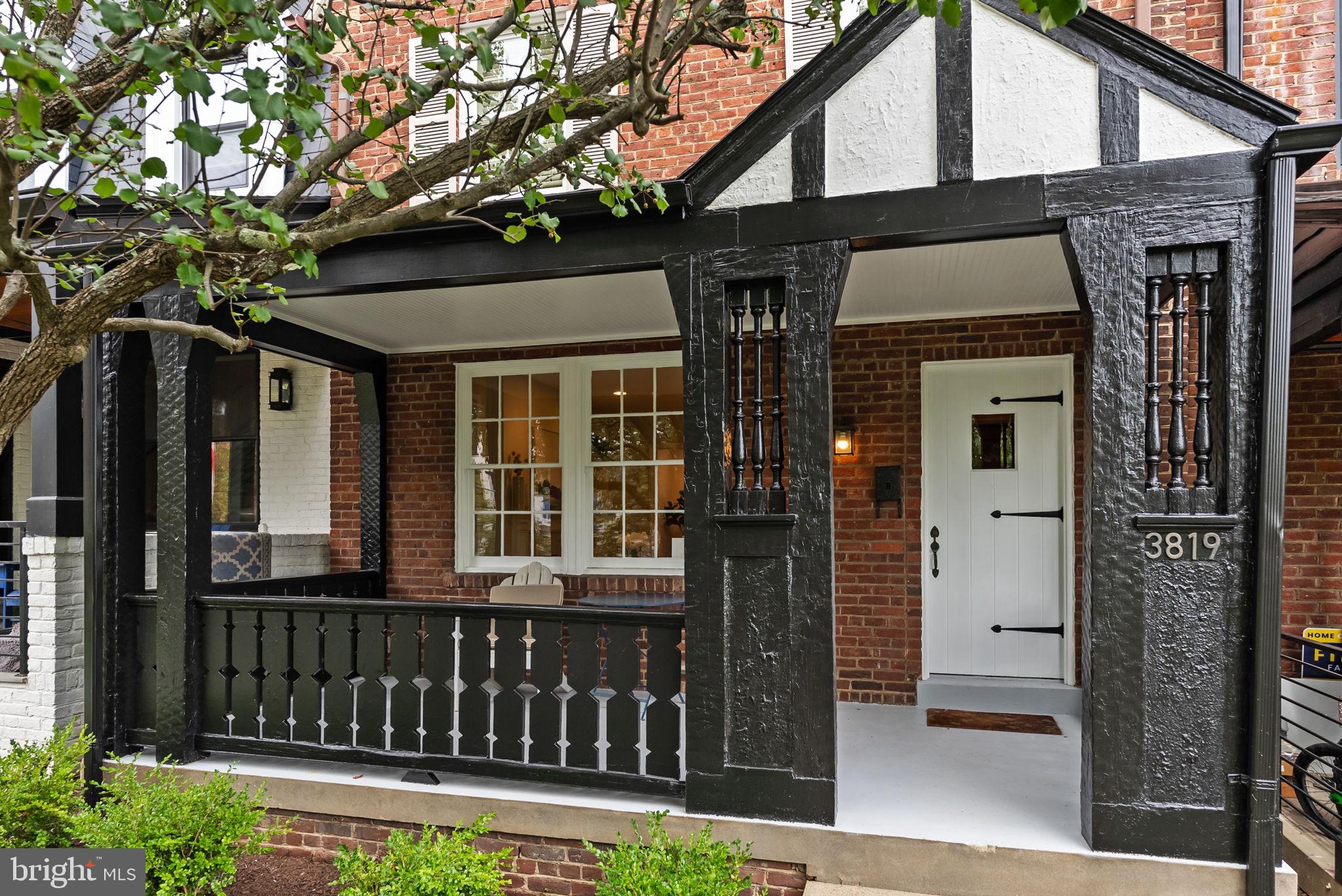 3819 T Street Northwest Washington, DC 20007 - Photo 3 of 27 a view of a house with a small yard and wooden floor and fence