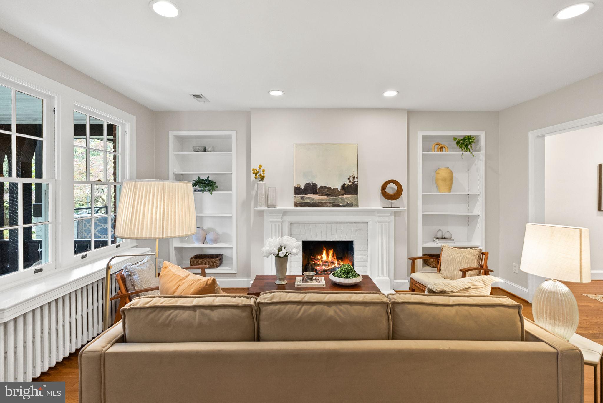 3819 T Street Northwest Washington, DC 20007 - Photo 4 of 27 a living room with furniture and a fireplace