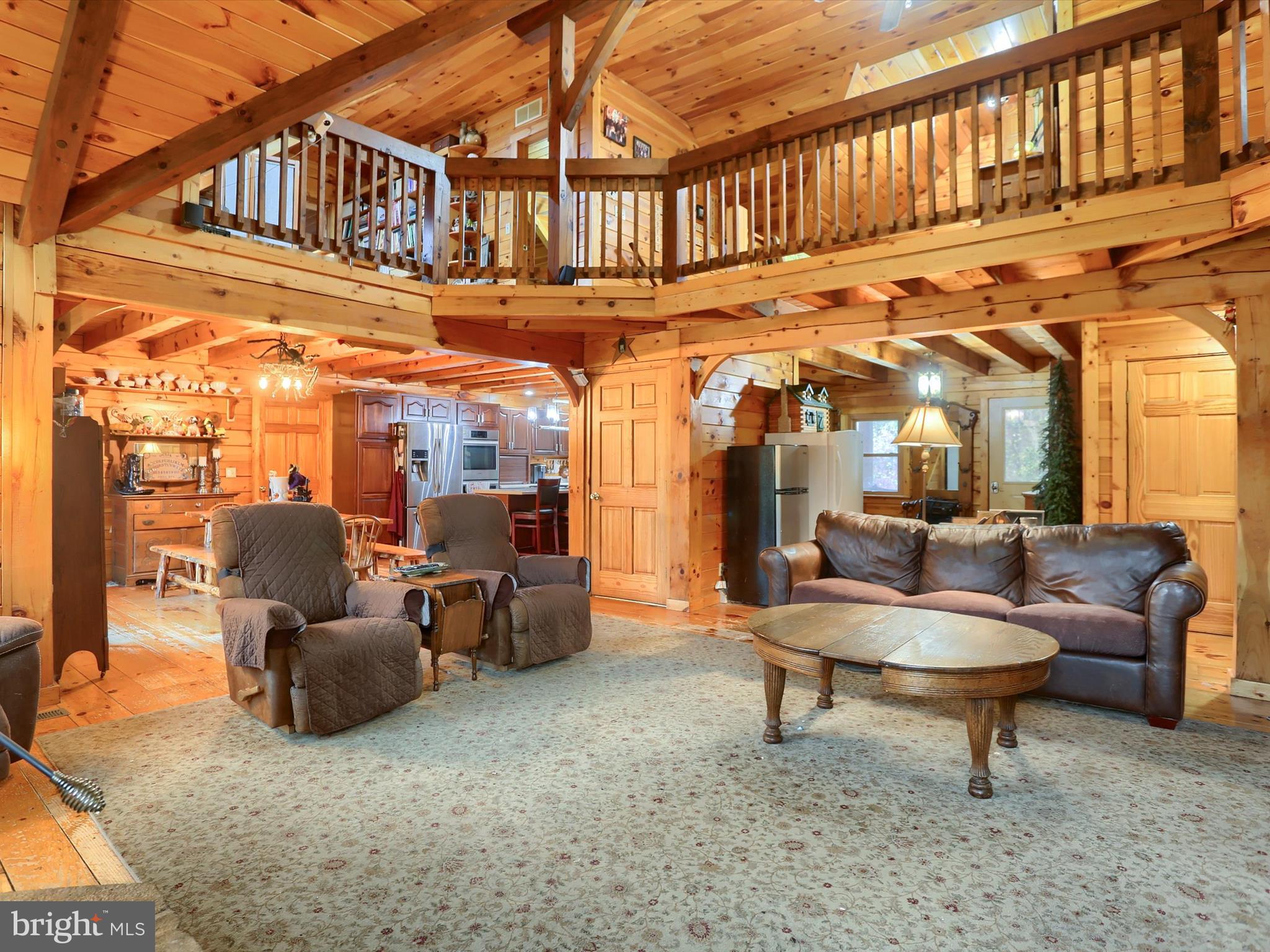 389 Church Road Shermans Dale, PA 17090 - Photo 11 of 88 a living room with furniture a ceiling fan and a rug