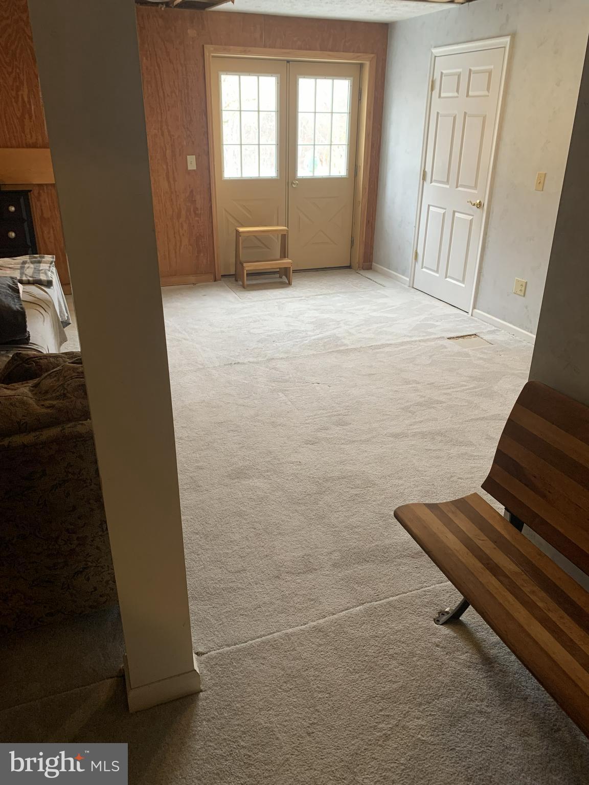 389 Church Road Shermans Dale, PA 17090 - Photo 58 of 88 a view of an empty room with wooden floor and windows
