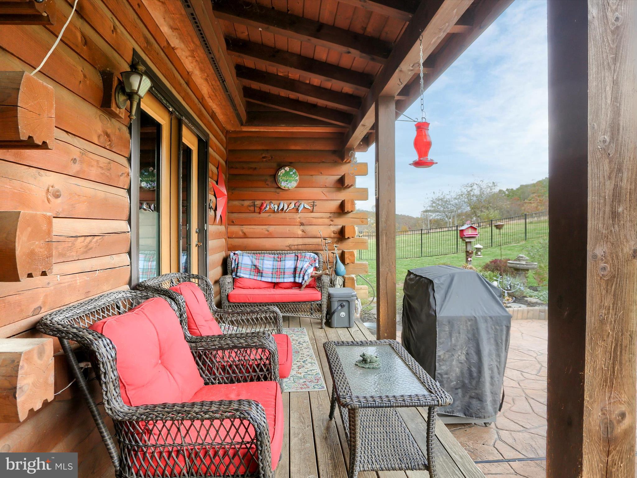 389 Church Road Shermans Dale, PA 17090 - Photo 65 of 85 a outdoor living space with patio furniture and a fireplace