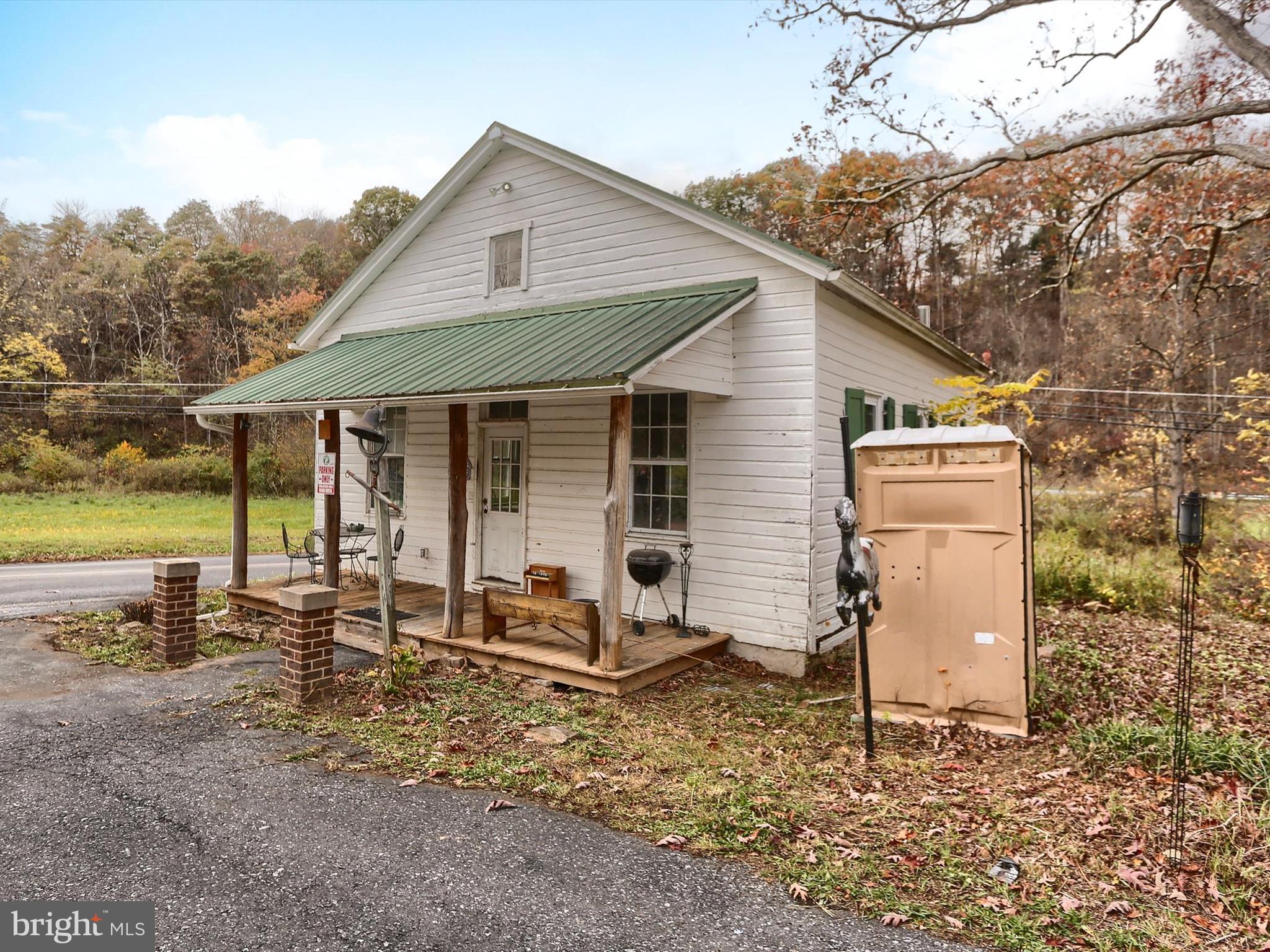 389 Church Road Shermans Dale, PA 17090 - Photo 72 of 85 a view of a house with backyard and chairs