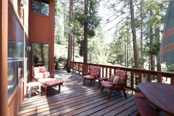 a view of a patio on wooden deck