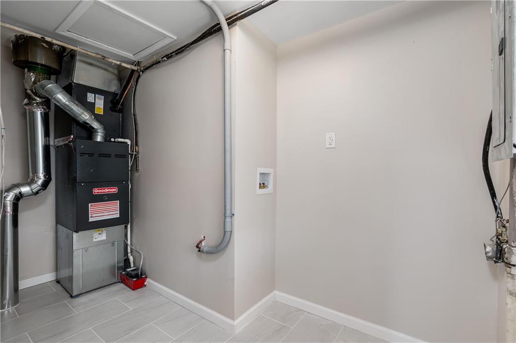 2706 Front Street Monaca, PA 15061 - Photo 16 of 31 a bathroom with a shower and a sink