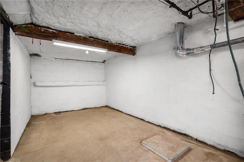 2706 Front Street Monaca, PA 15061 - Photo 18 of 31 a view of a room with racks on the wall