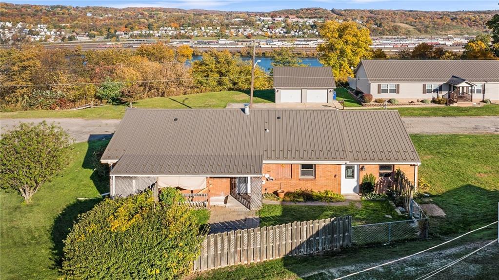 2706 Front Street Monaca, PA 15061 - Photo 19 of 31 an aerial view of a house with a garden and lake view