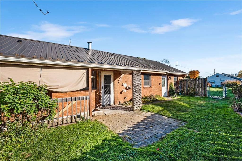 2706 Front Street Monaca, PA 15061 - Photo 21 of 31 a front view of a house with garden