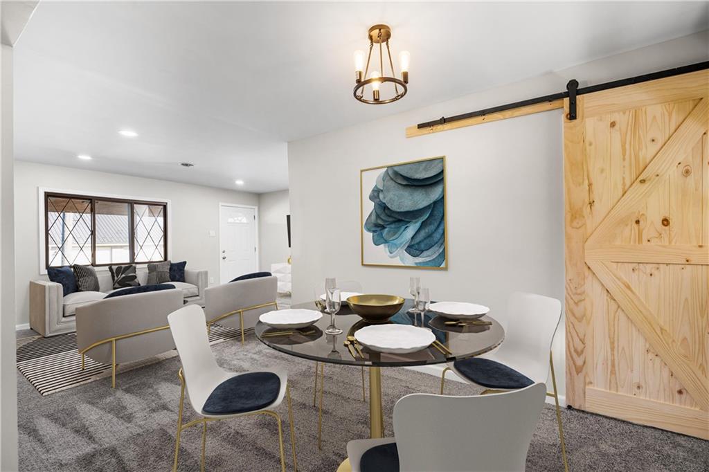 2706 Front Street Monaca, PA 15061 - Photo 4 of 31 a living room with furniture and a table