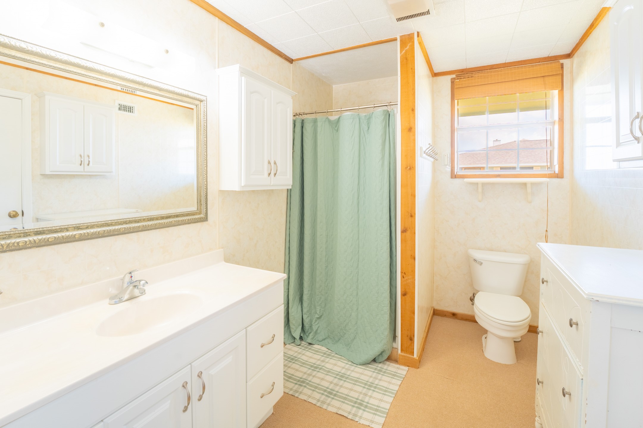234 El Campo Beach Road Palacios, TX 77465 - Photo 12 of 25 a bathroom with a sink a toilet and shower