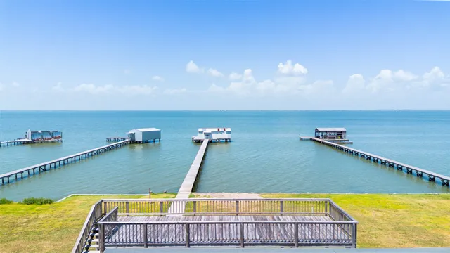 a view of swimming pool with an outdoor seating
