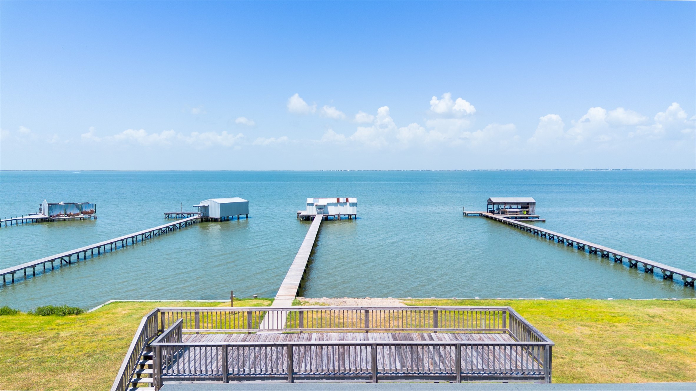 234 El Campo Beach Road Palacios, TX 77465 - Photo 17 of 25 a view of a swimming pool with an outdoor seating and yard