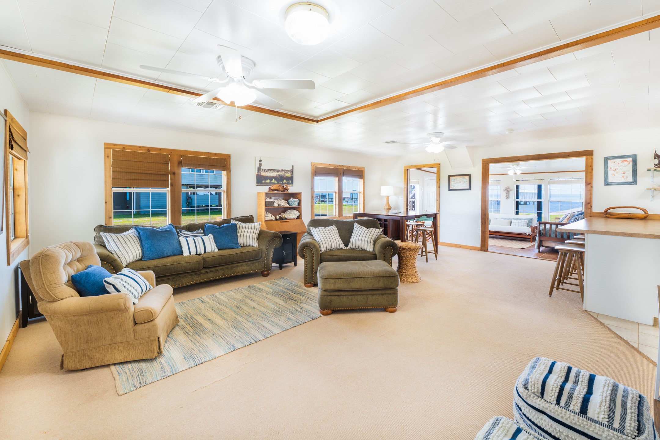 234 El Campo Beach Road Palacios, TX 77465 - Photo 5 of 25 a living room with furniture and a large window