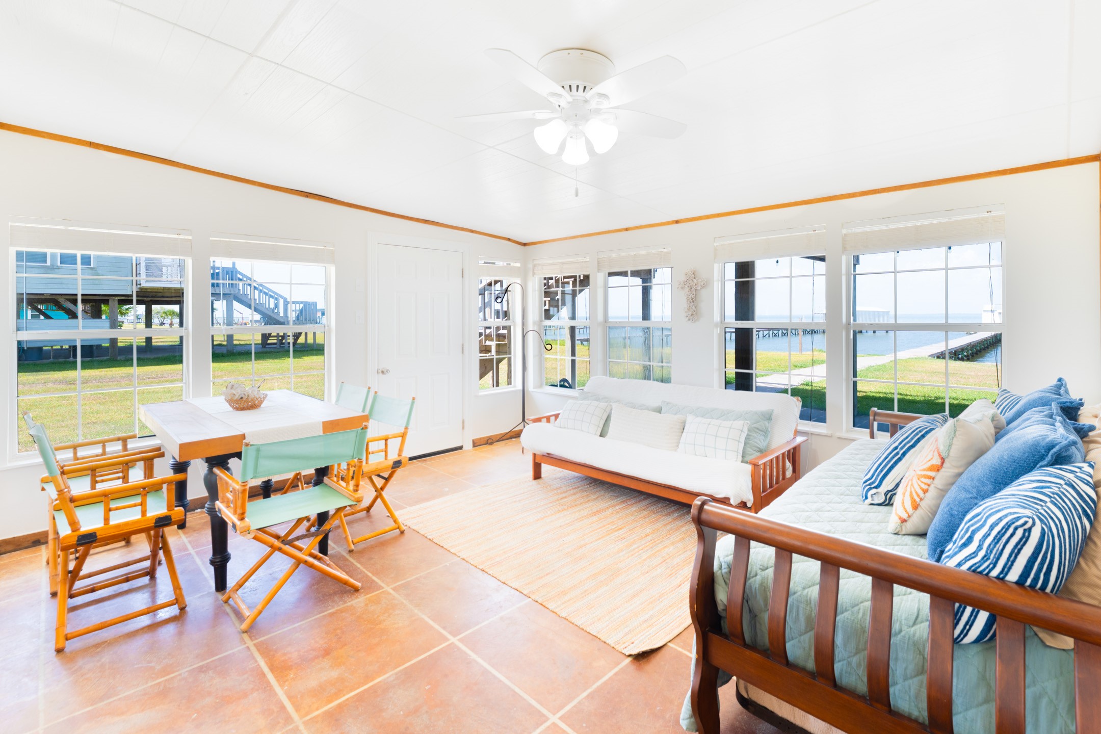 234 El Campo Beach Road Palacios, TX 77465 - Photo 8 of 25 a living room with furniture and a large window
