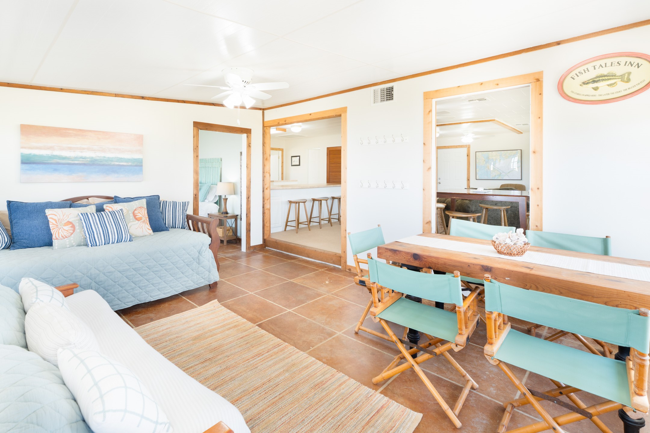 234 El Campo Beach Road Palacios, TX 77465 - Photo 9 of 25 a bedroom with a bed and a large window