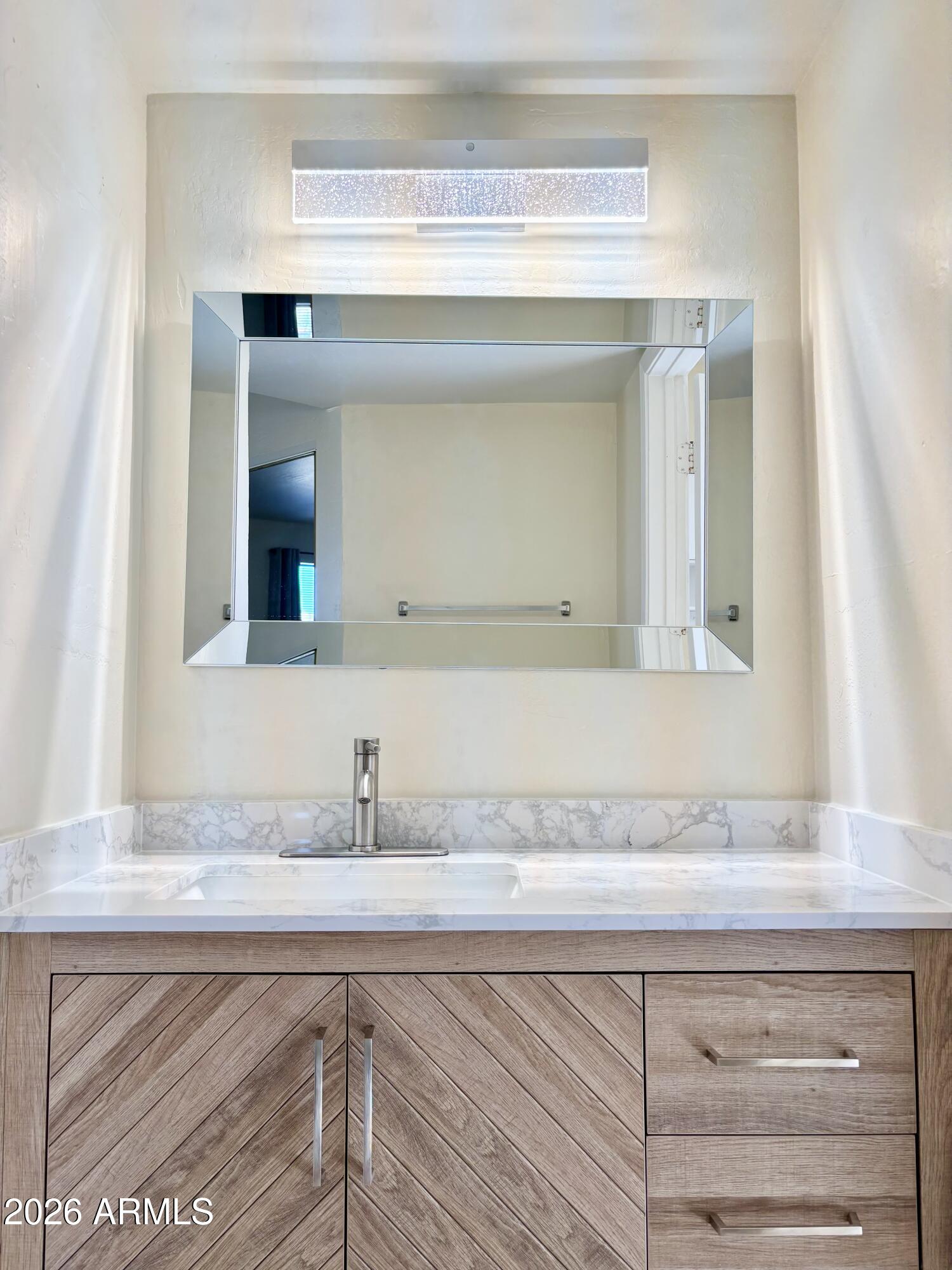 4213 West Calavar Road Phoenix, AZ 85053 - Photo 11 of 20 Master Bath Vanity
