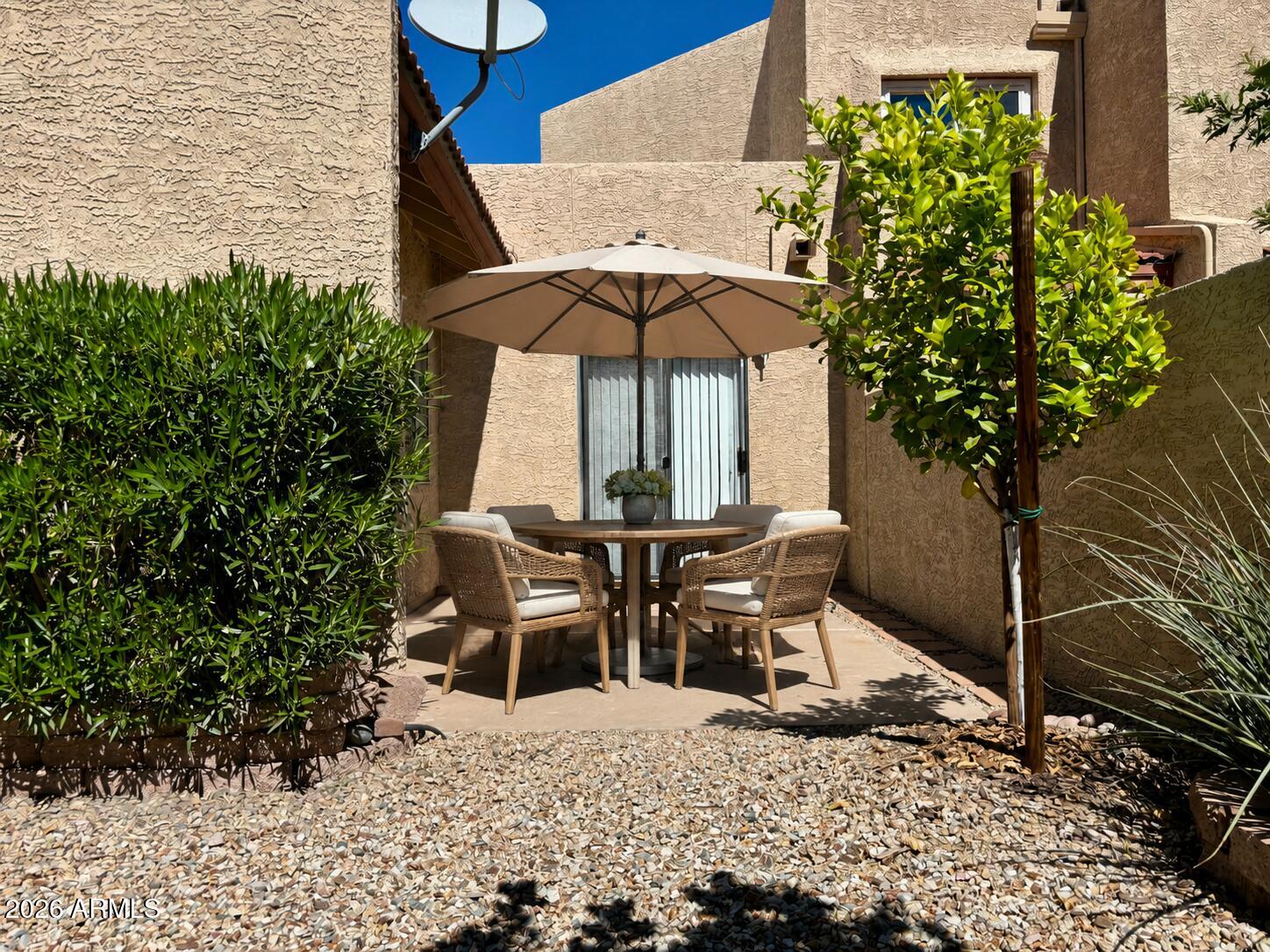 4213 West Calavar Road Phoenix, AZ 85053 - Photo 4 of 20 Patio Virtually Staged
