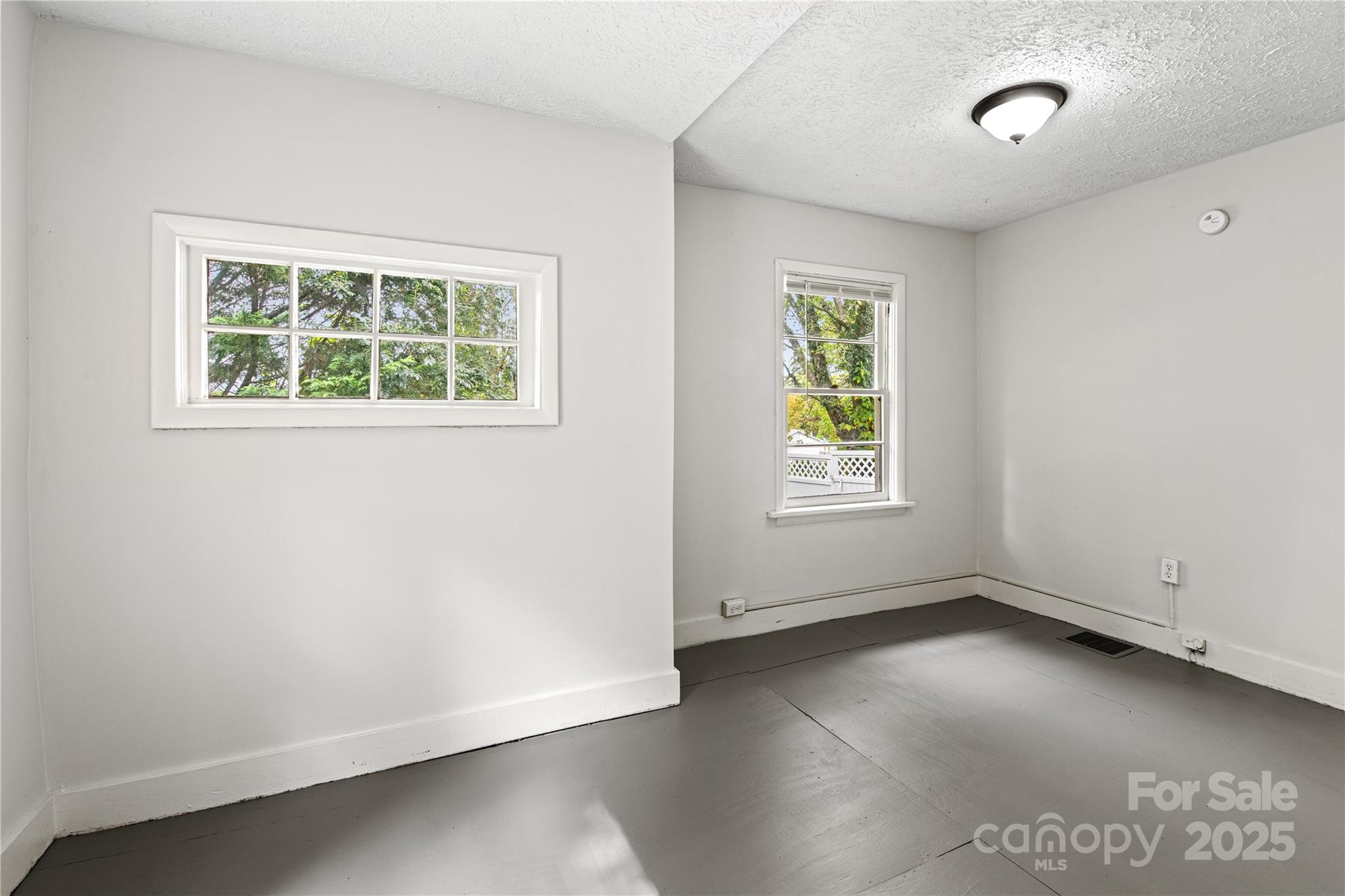 29 Le-An-Hurst Road Asheville, NC 28803 - Photo 16 of 22 an empty room with a window