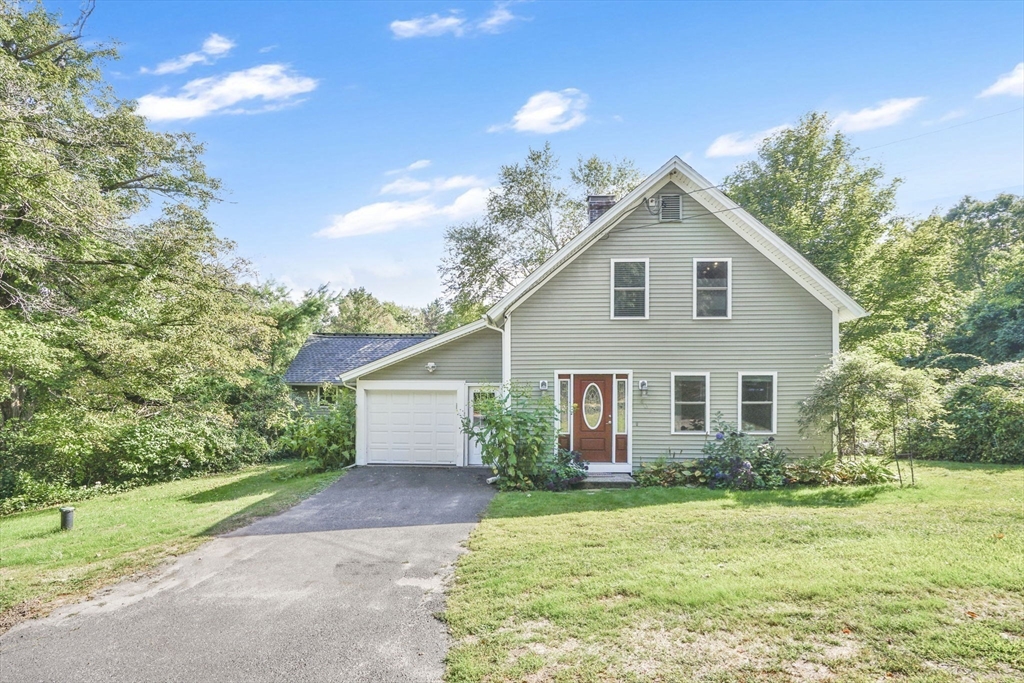 407 Monson Road Wilbraham, MA 01095 - Photo 37 of 38 a view of a house with yard and a garden
