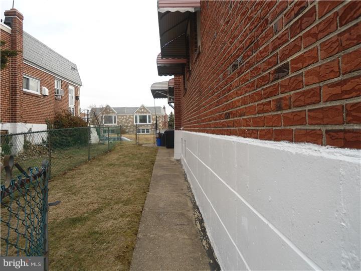 8914 Blue Grass Road Philadelphia, PA 19152 - Photo 2 of 17 Side Yard