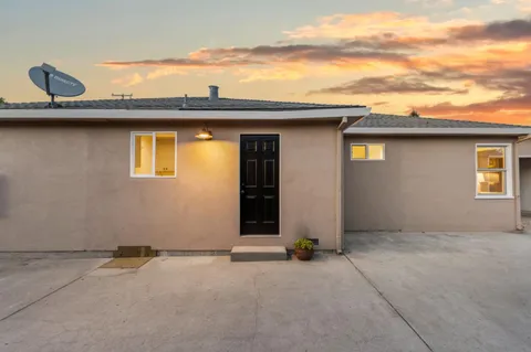 a view of a house with a patio