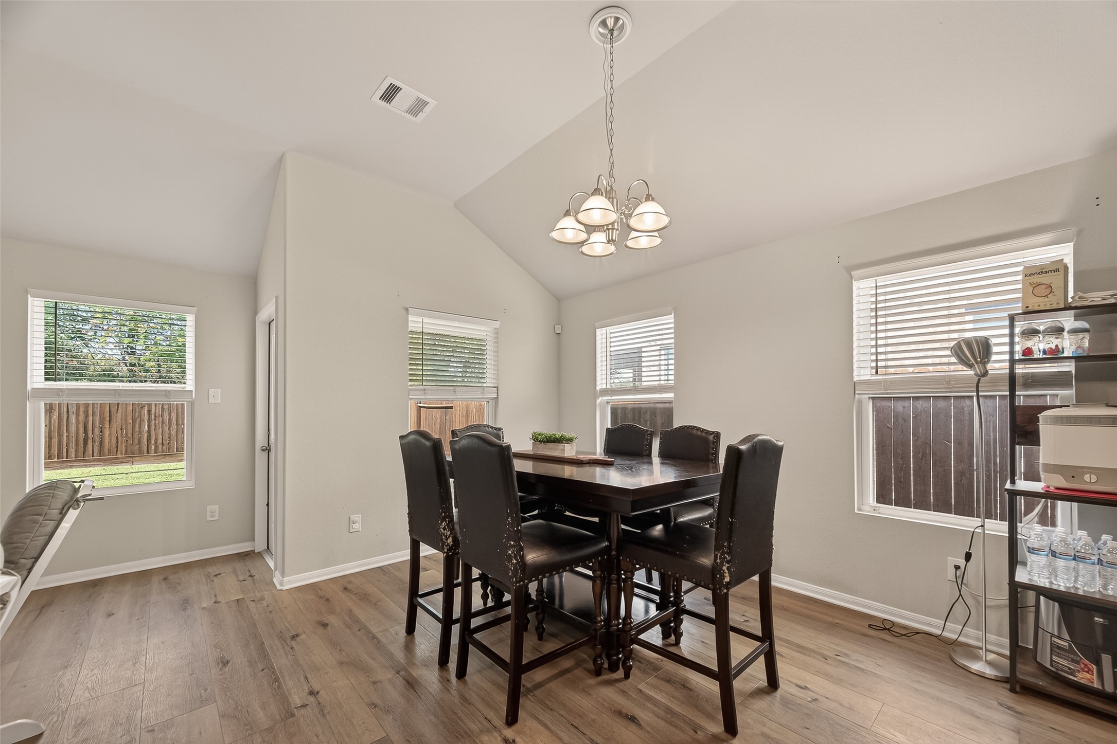 11311 Cascading Stream Way Houston, TX 77044 - Photo 17 of 33 a view of a dining room with furniture window and wooden floor
