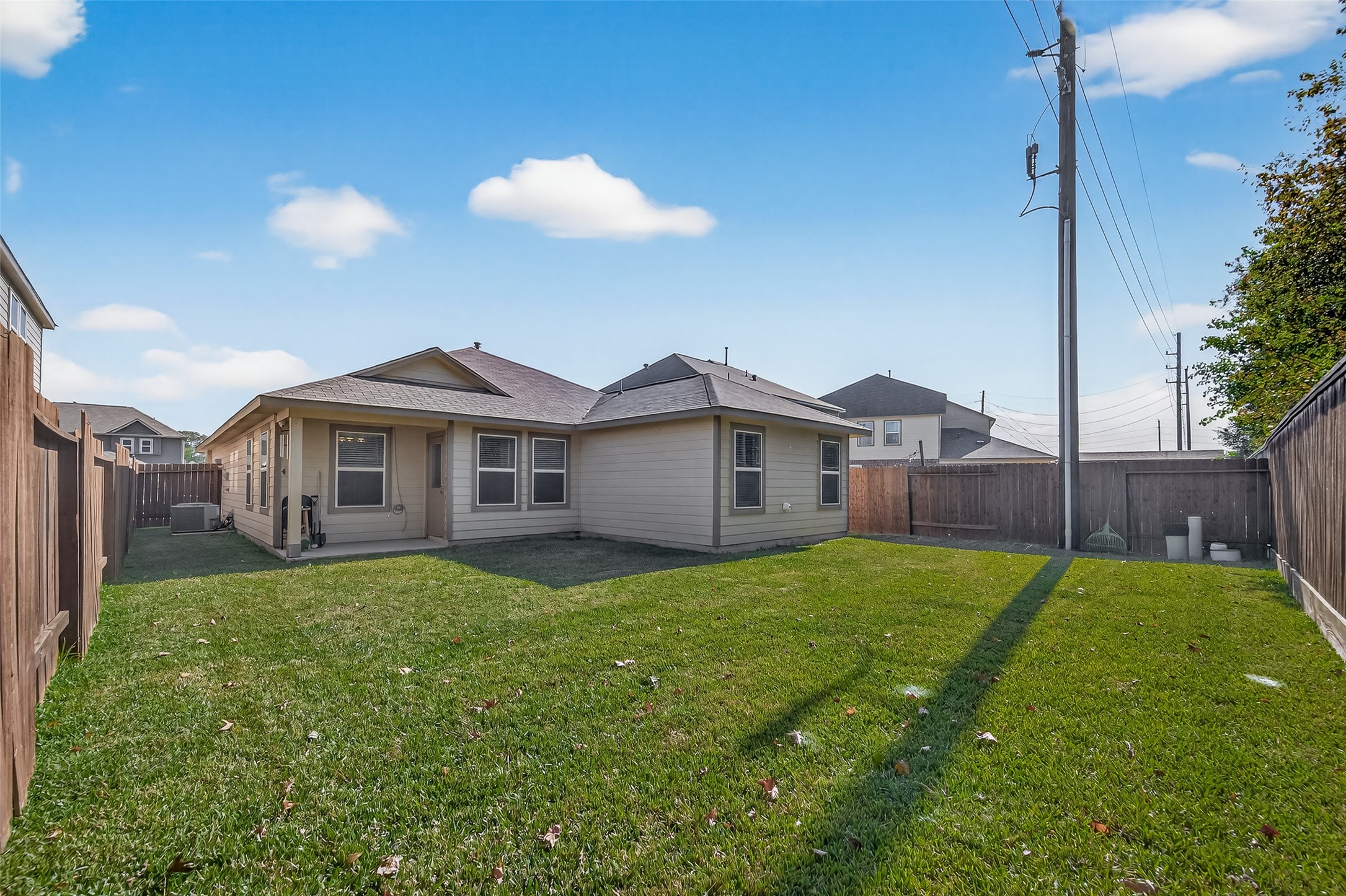 11311 Cascading Stream Way Houston, TX 77044 - Photo 29 of 33 a view of a yard in front of a house with a yard
