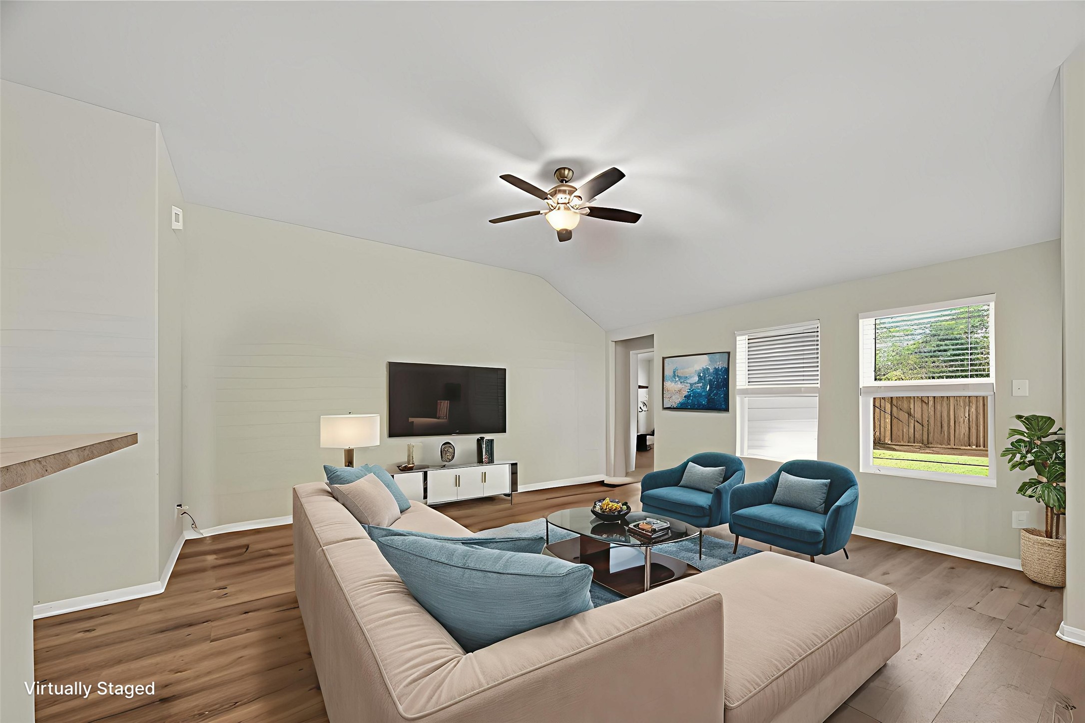 11311 Cascading Stream Way Houston, TX 77044 - Photo 3 of 33 a living room with furniture ceiling fan and a window