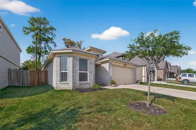 a house view with a garden space