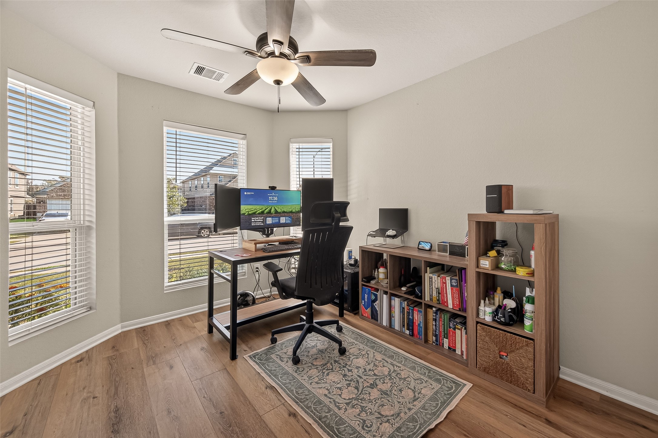 11311 Cascading Stream Way Houston, TX 77044 - Photo 7 of 33 a view of a workspace with furniture and a window