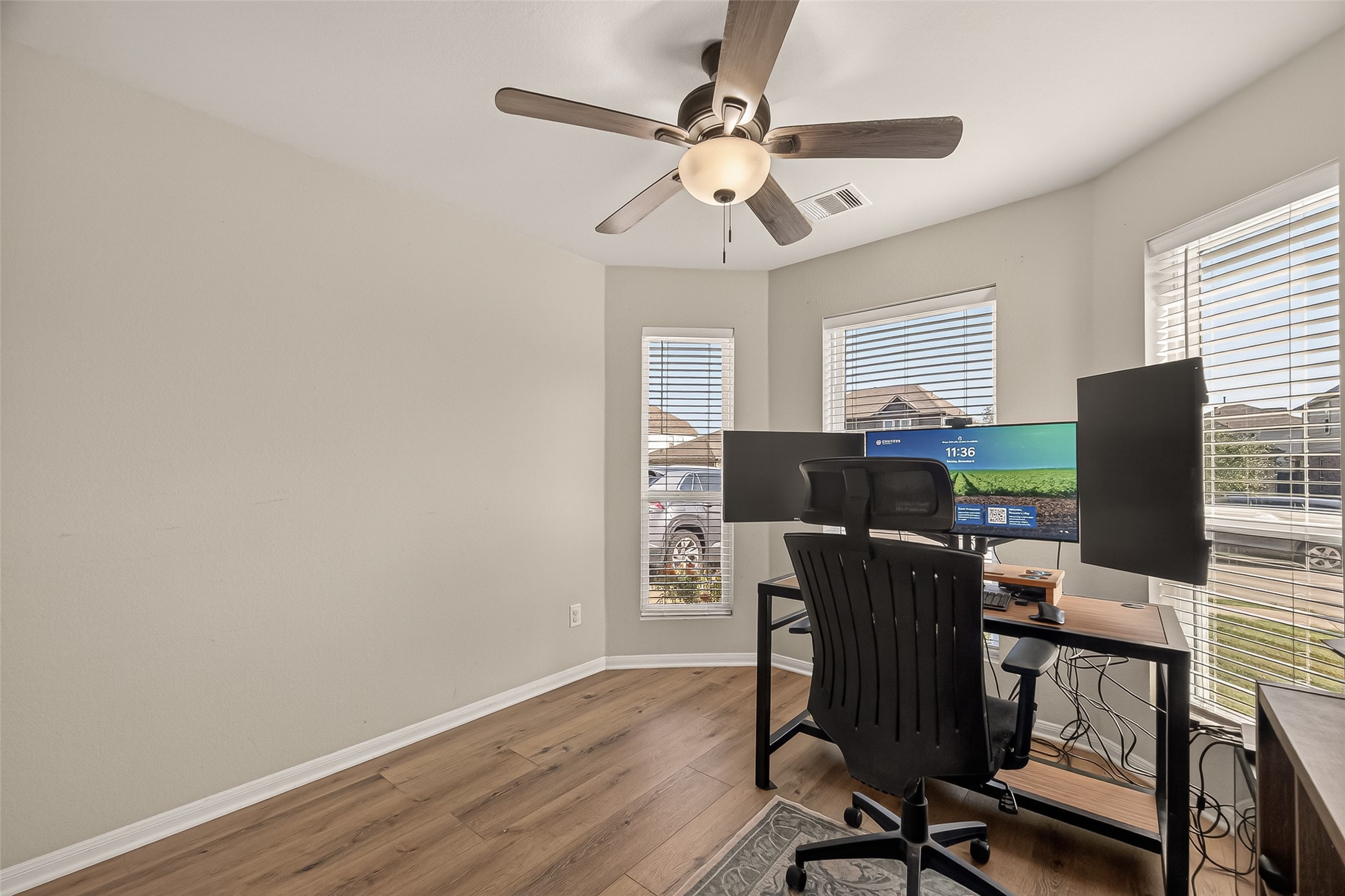 11311 Cascading Stream Way Houston, TX 77044 - Photo 8 of 33 a view of a workspace with furniture and a window