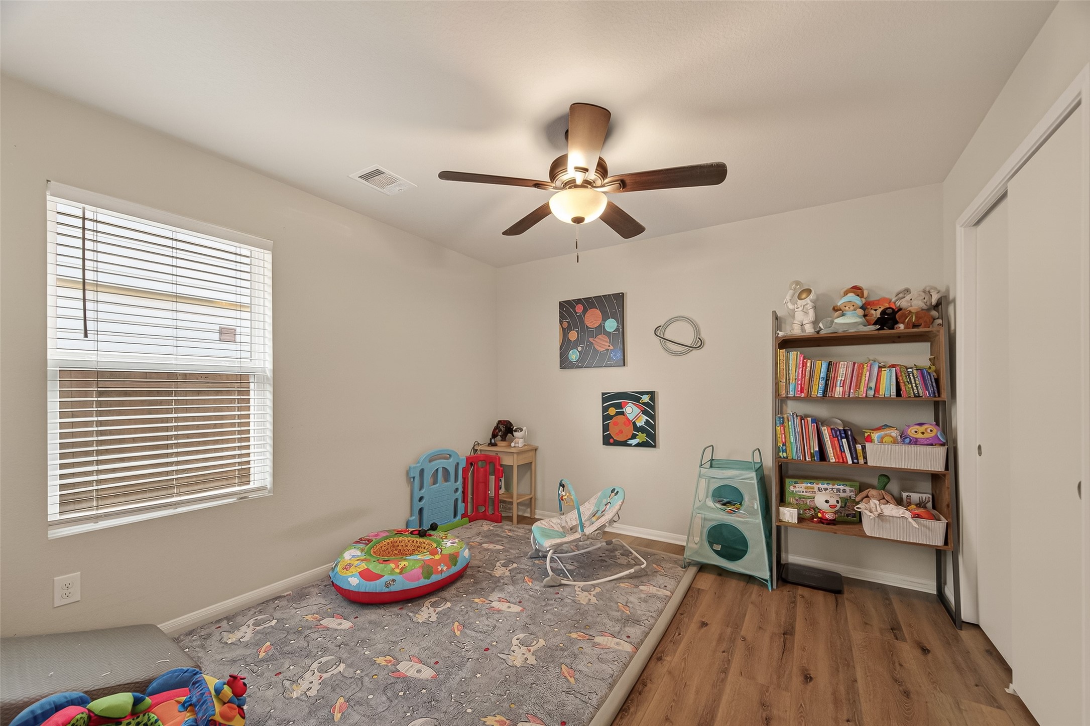 11311 Cascading Stream Way Houston, TX 77044 - Photo 10 of 33 a living room with furniture and a wooden floor
