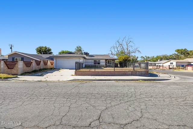 a view of houses with outdoor space