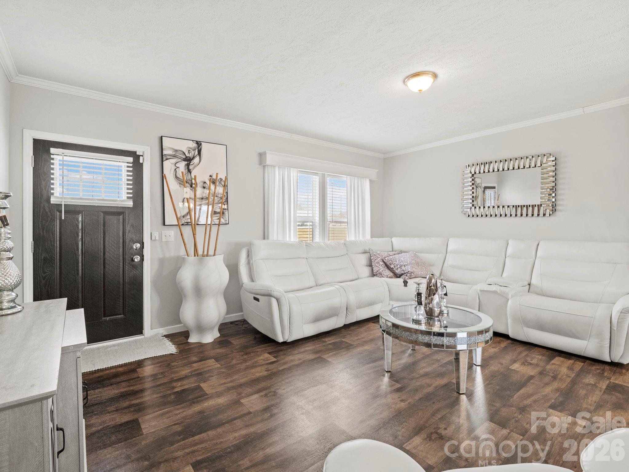 1796 Pilot Mountain Road Hendersonville, NC 28792 - Photo 12 of 26 a living room with furniture and a window