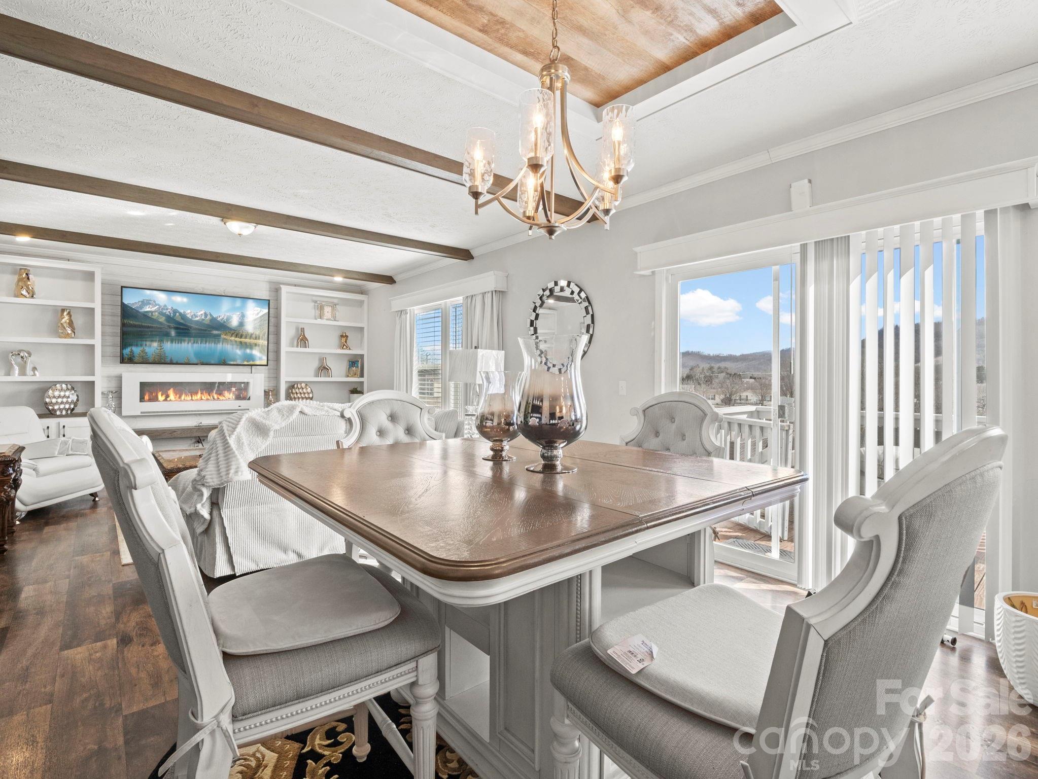 1796 Pilot Mountain Road Hendersonville, NC 28792 - Photo 16 of 26 a dining room with furniture and window