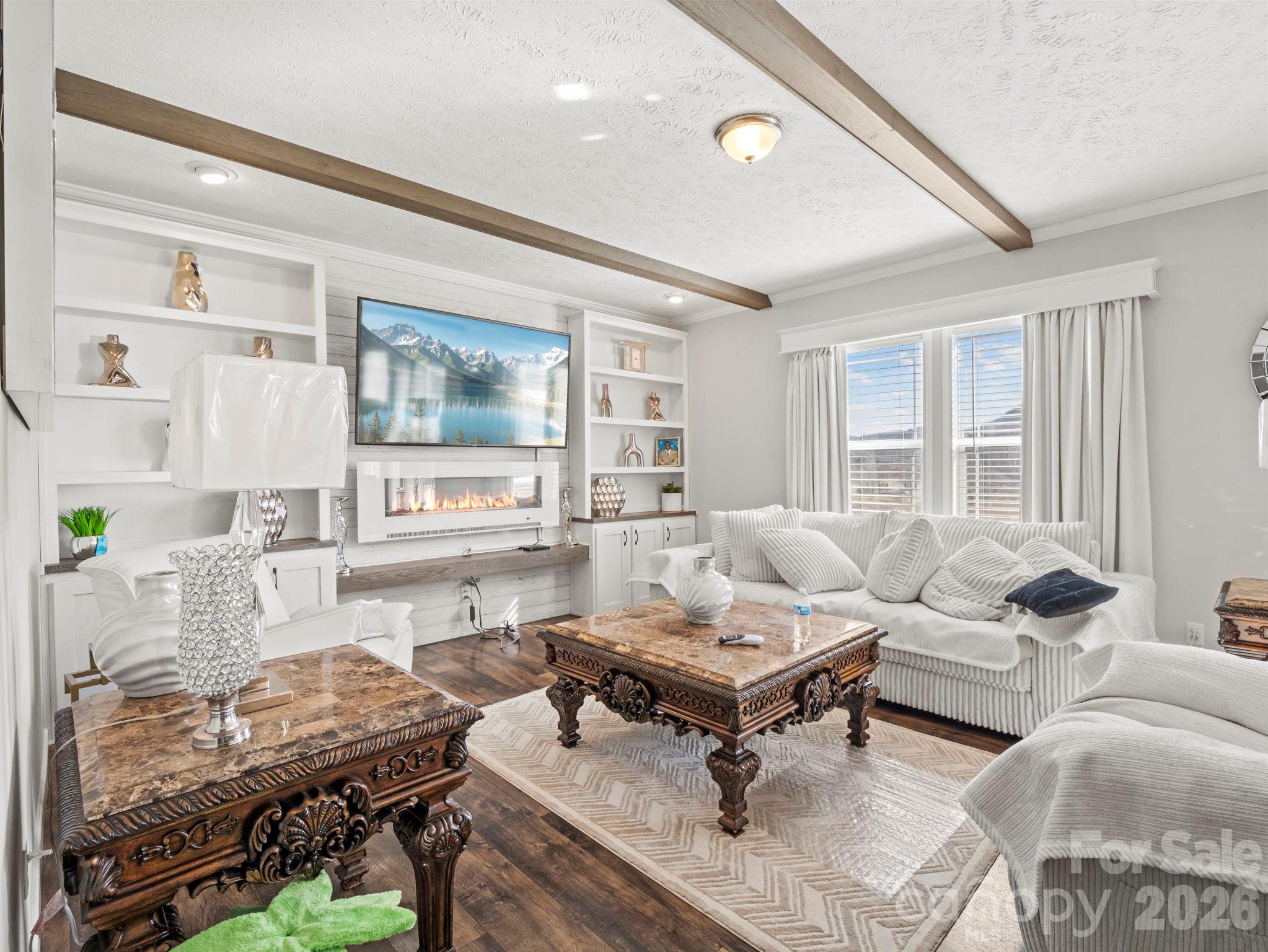 1796 Pilot Mountain Road Hendersonville, NC 28792 - Photo 18 of 26 a living room with furniture and a large window
