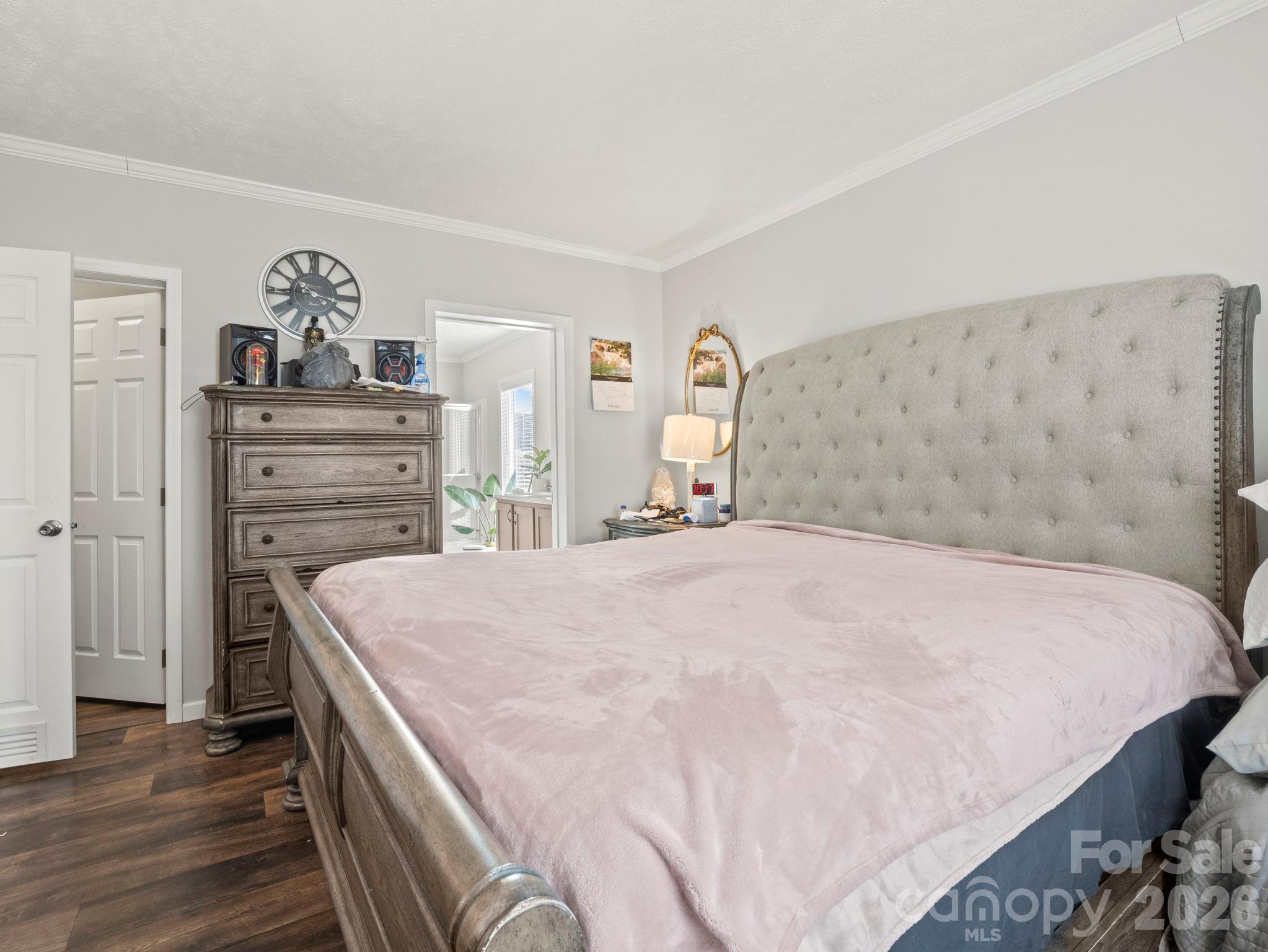 1796 Pilot Mountain Road Hendersonville, NC 28792 - Photo 24 of 26 a bedroom with a bed and a dresser