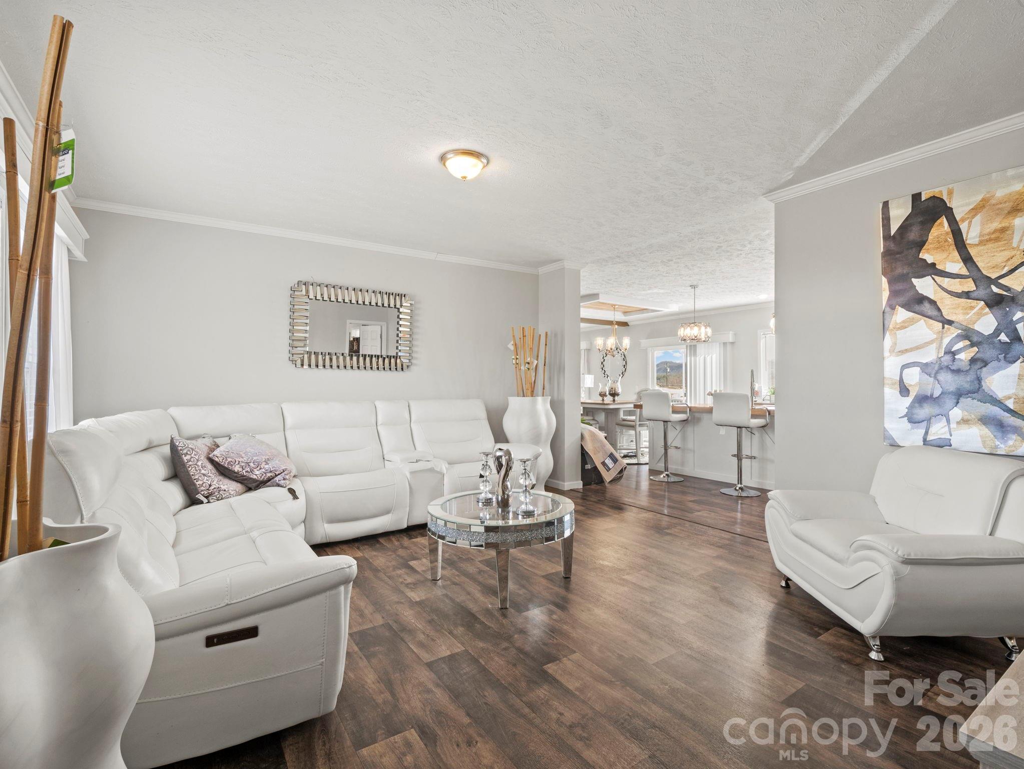 1796 Pilot Mountain Road Hendersonville, NC 28792 - Photo 10 of 26 a living room with furniture and a large window