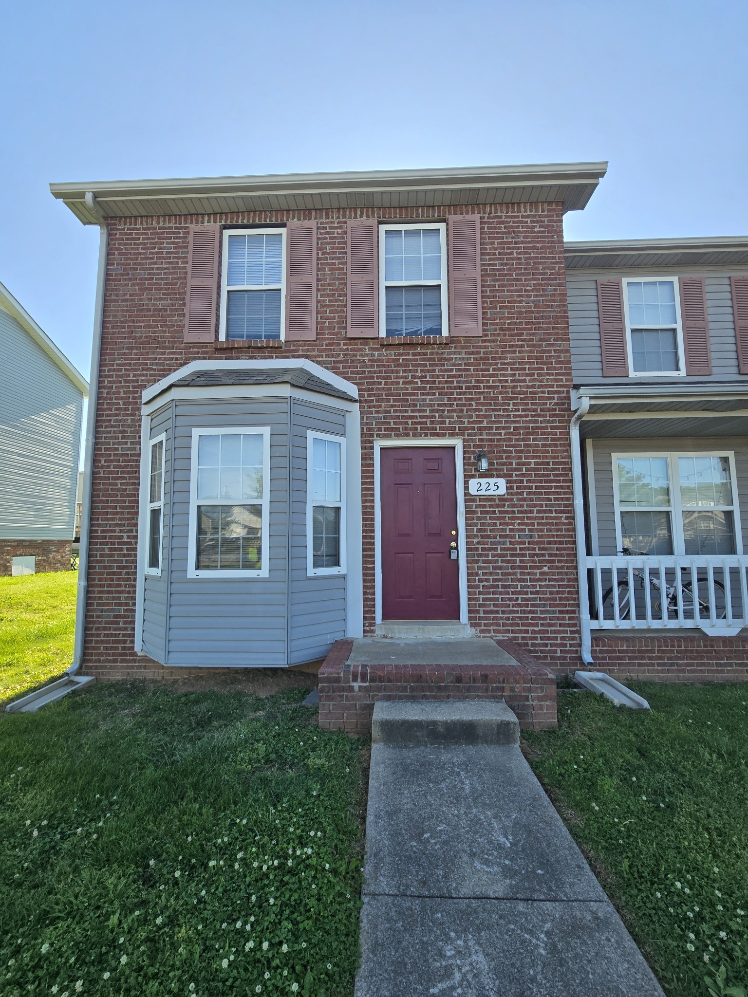 225 Tree Line Drive Oak Grove, KY 42262 - Photo 1 of 17 a front view of a house with garden
