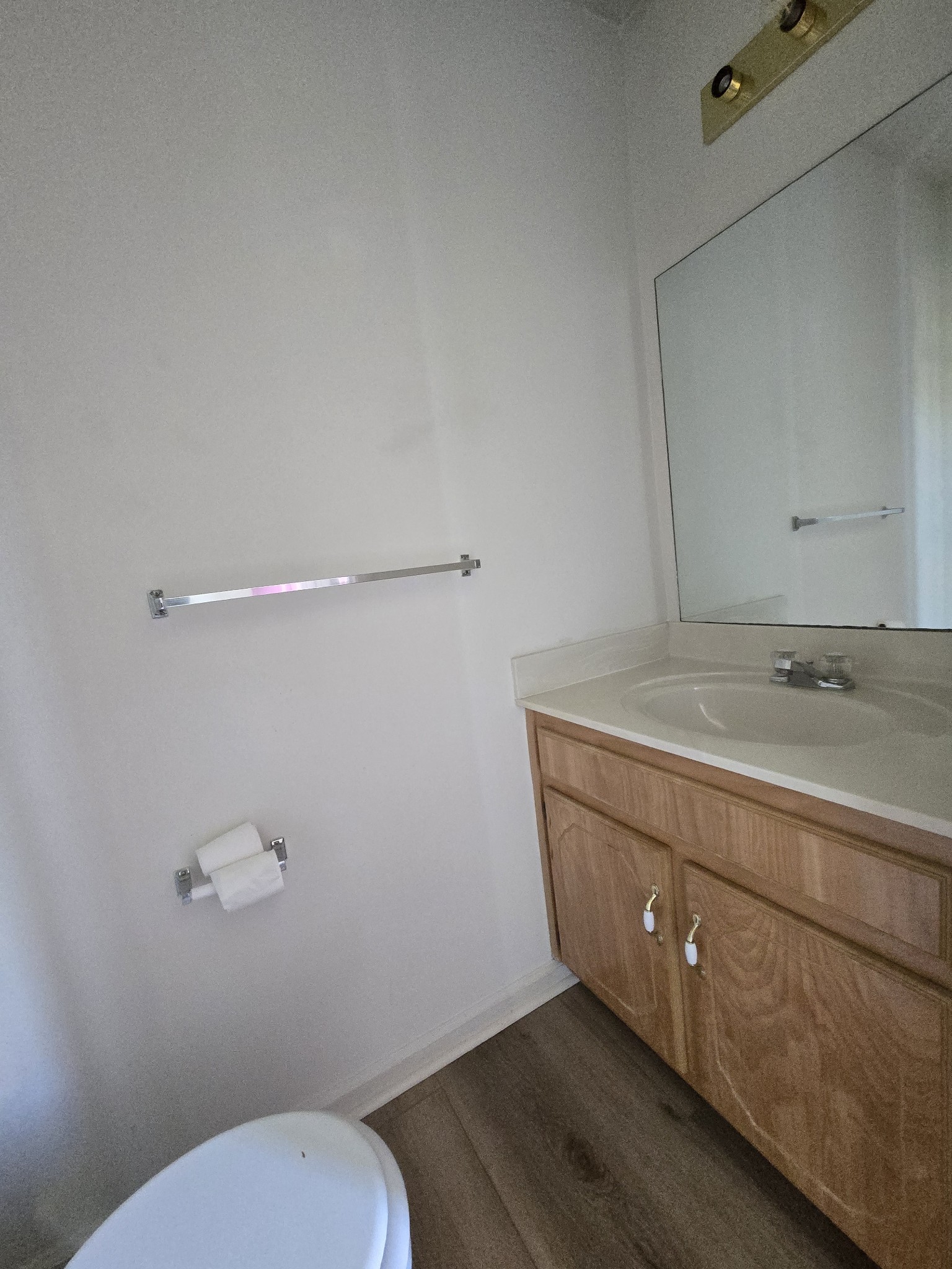 225 Tree Line Drive Oak Grove, KY 42262 - Photo 6 of 17 a bathroom with a granite countertop toilet and a sink