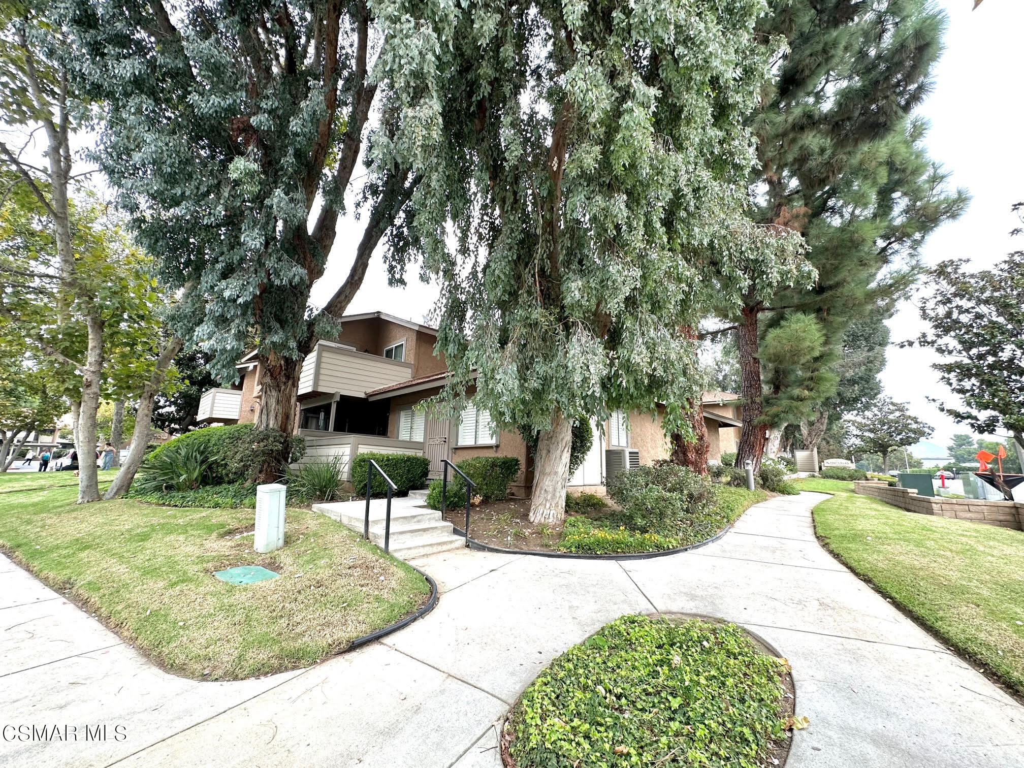 4541 Alamo Street, Unit A Simi Valley, CA 93063 - Photo 3 of 20 a front view of a house with garden