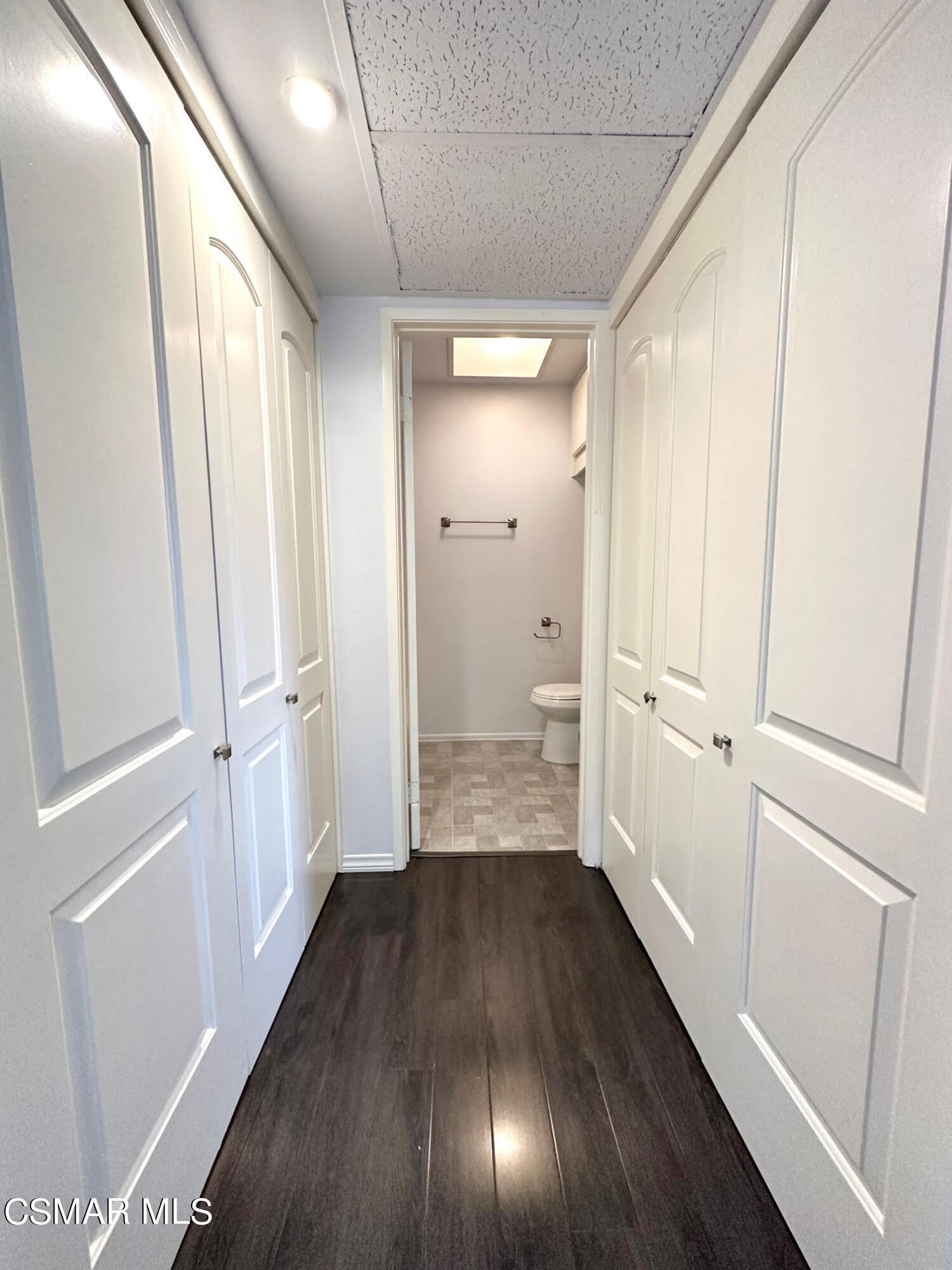 4541 Alamo Street, Unit A Simi Valley, CA 93063 - Photo 8 of 20 a view of a hallway with wooden floor