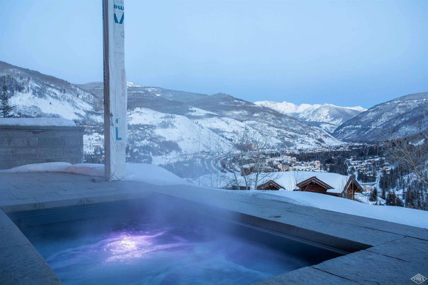 1450 Buffehr Creek Road Vail, CO 81657 - Photo 12 of 16 a view of a house with a snow